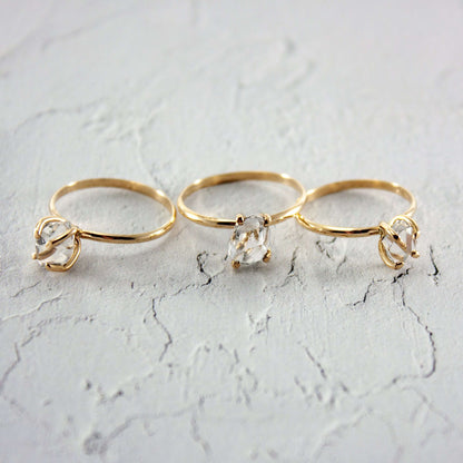 Raw Herkimer Diamond 14k Gold Filled Prong Ring showcasing a sparkling raw diamond in a gold setting.