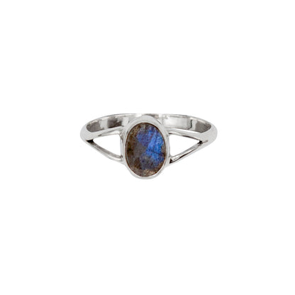 Oval Labradorite bezel split shank sterling silver ring by Grey Clymene, featuring a polished labradorite gemstone and intricate silver band design.