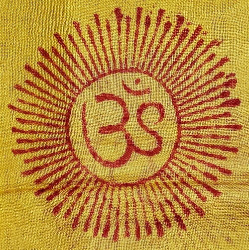 Yellow Primordial Om and Ganesha printed scarf by Silver Hestia, featuring vibrant yellow fabric with intricate spiritual prints.