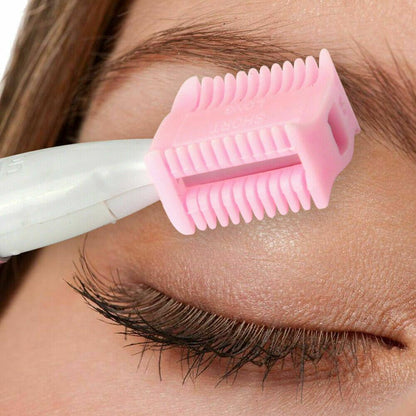 Fuchsia Electra portable electric eyebrow remover and facial hair trimmer with compact design for home facial hair grooming.