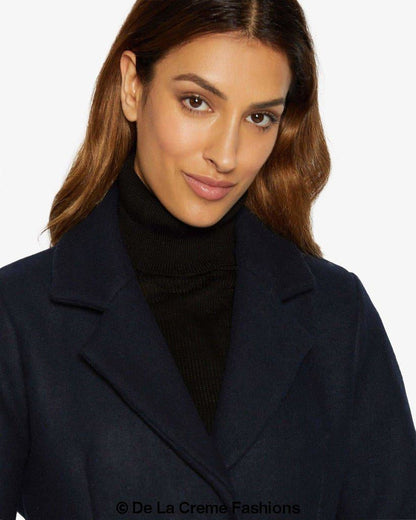Rose Eleusis Sara Covert button-up coat, stylish jacket with a tailored fit, shown in a neutral color with collar and front buttons.
