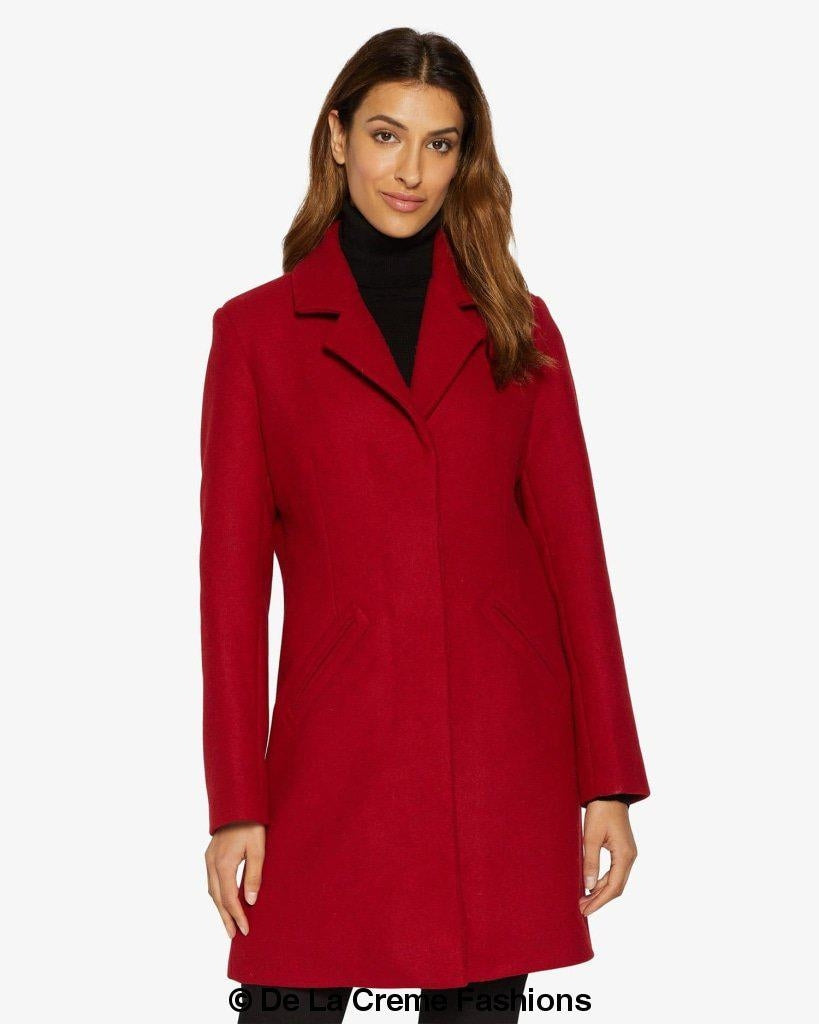 Rose Eleusis Sara Covert button-up coat displayed on a model, featuring a stylish jacket with a classic collar and button details.