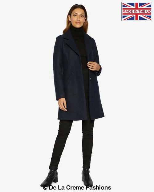 Navy Sara Covert Button Up Coat by Rose Eleusis, styled on a model, showcasing the tailored design and classic collar.