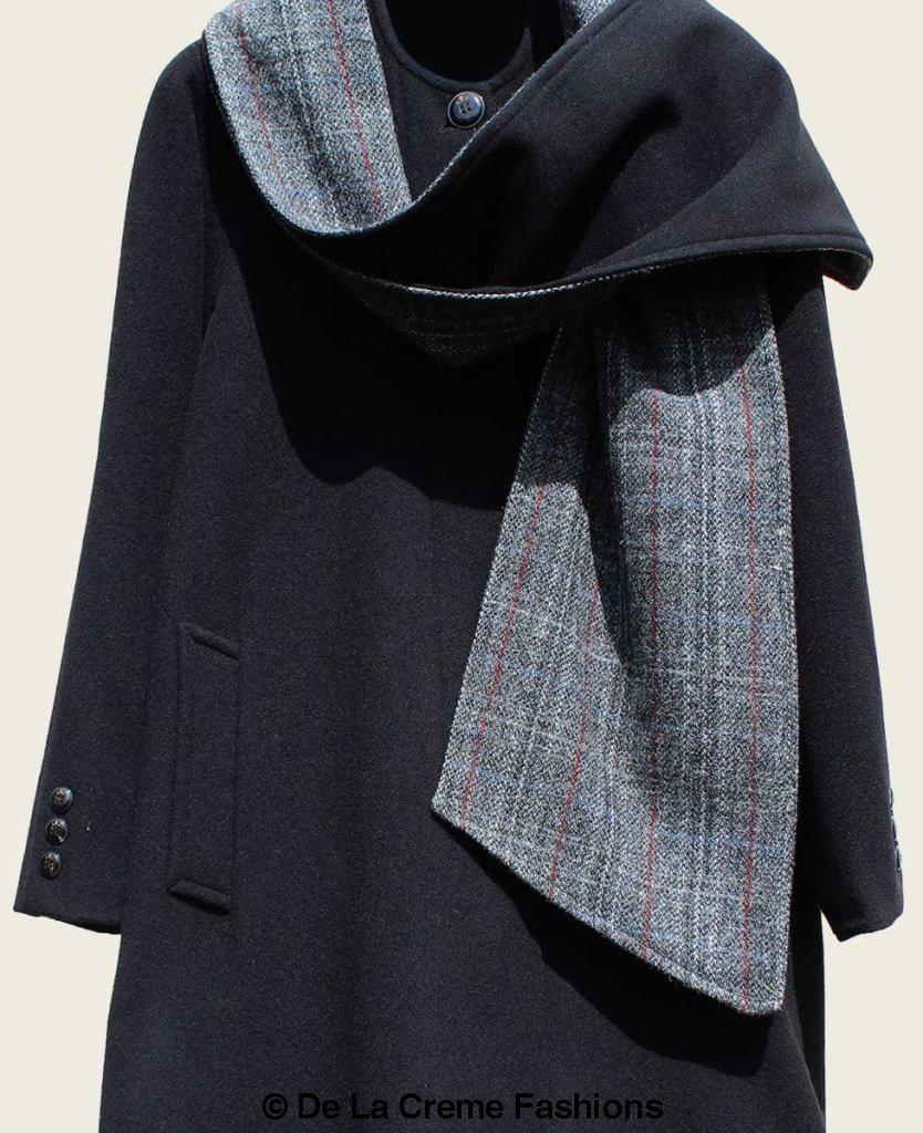 Rose Eleusis ScarpiA wool and cashmere overcoat with integrated scarf detail, showcasing a stylish, warm jacket with elegant design.