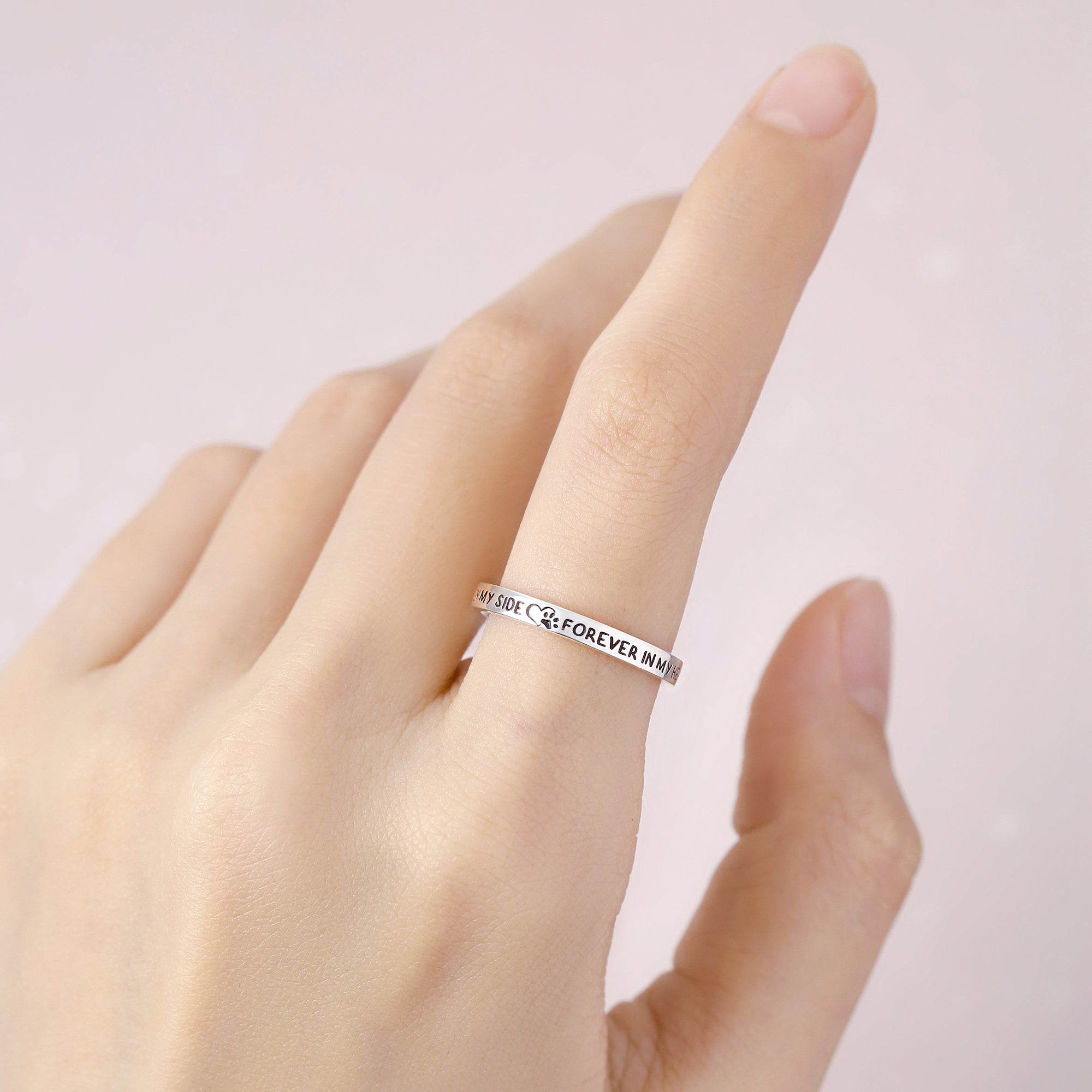 Green Millie pet memorial ring featuring engraved pet name, a heartfelt pet loss gift for dog or cat moms.