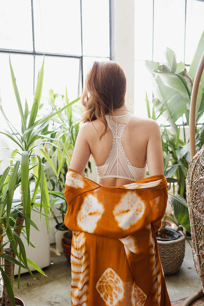 Periwinkle Aether lace racerback bralette with seamless design and soft wireless comfort, featuring delicate lace details.