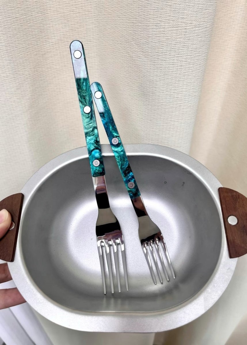 Set of 10 modern elegant terra flatware Bistrot style silverware set for home decor, featuring sleek silver cutlery for dining.
