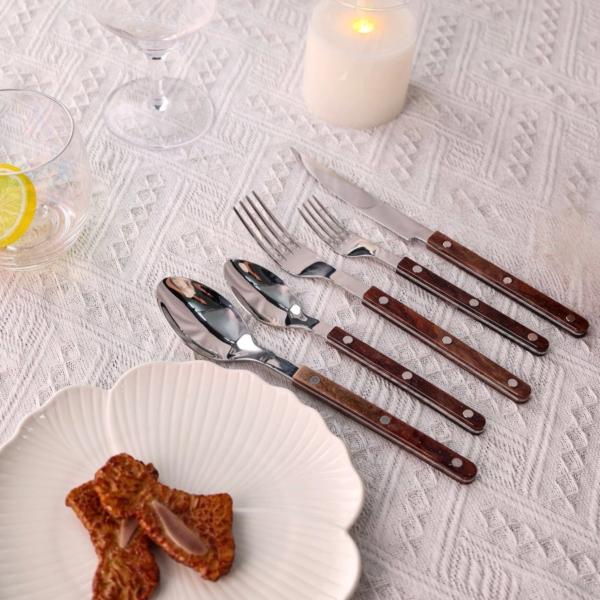 Set of 10 modern Nebula cutlery pieces in Bistrot style with rivet details, ideal for stylish home dining and decor.