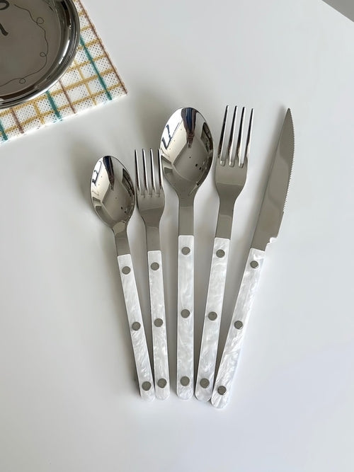 Set of 10 modern Nebula Bistrot style flatware with rivet details, ideal for home decor and table setting by Inspecial Home.