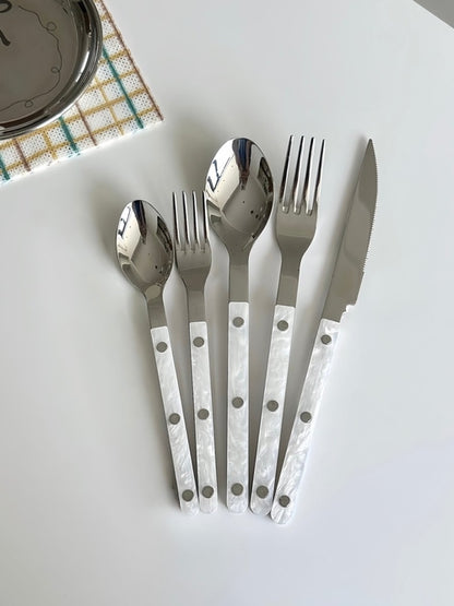 Set of 10 modern Nebula Bistrot style flatware with rivet details, ideal for home decor and table setting by Inspecial Home.