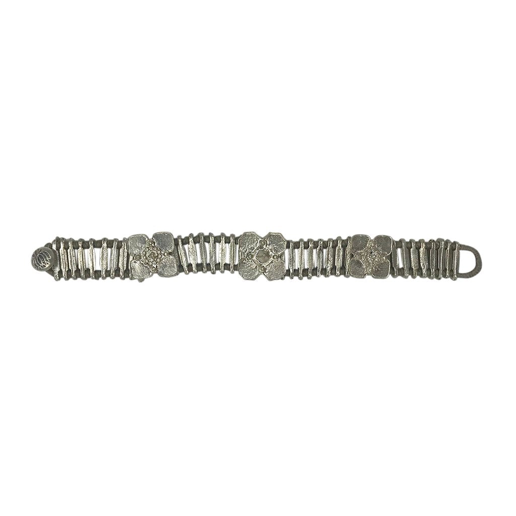 Silver Kali Flower Bracelet by Ariel featuring intricate flower designs, perfect for elegant jewelry and watch accessories.