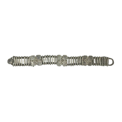 Silver Kali Flower Bracelet by Ariel featuring intricate flower designs, perfect for elegant jewelry and watch accessories.