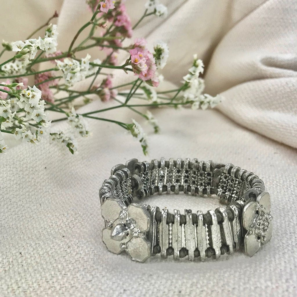 Silver Kali Flower bracelet by Ariel featuring a delicate flower design in jewelry and watches collection.