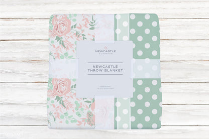 Kids and babies cotton muslin throw blanket featuring desert rose and jade polka dots by Lavender Charlie.