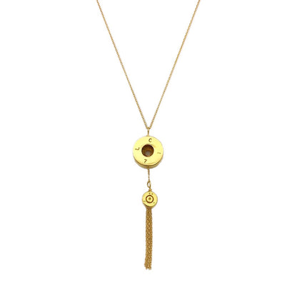 Ariel Bullet Tassel Necklace with slate-colored beads and tassel pendant, stylish jewelry accessory for women.