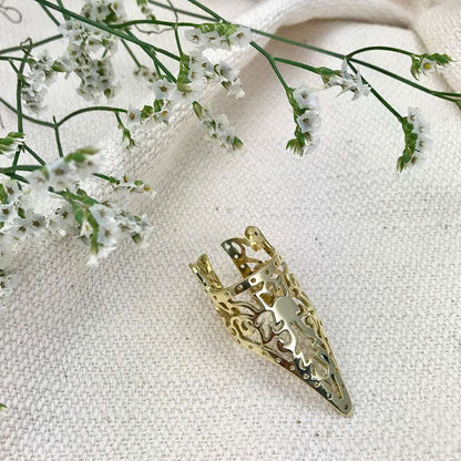Ariel Khmer Temple Ring featuring intricate carvings inspired by Cambodian temples, made of silver jewelry.