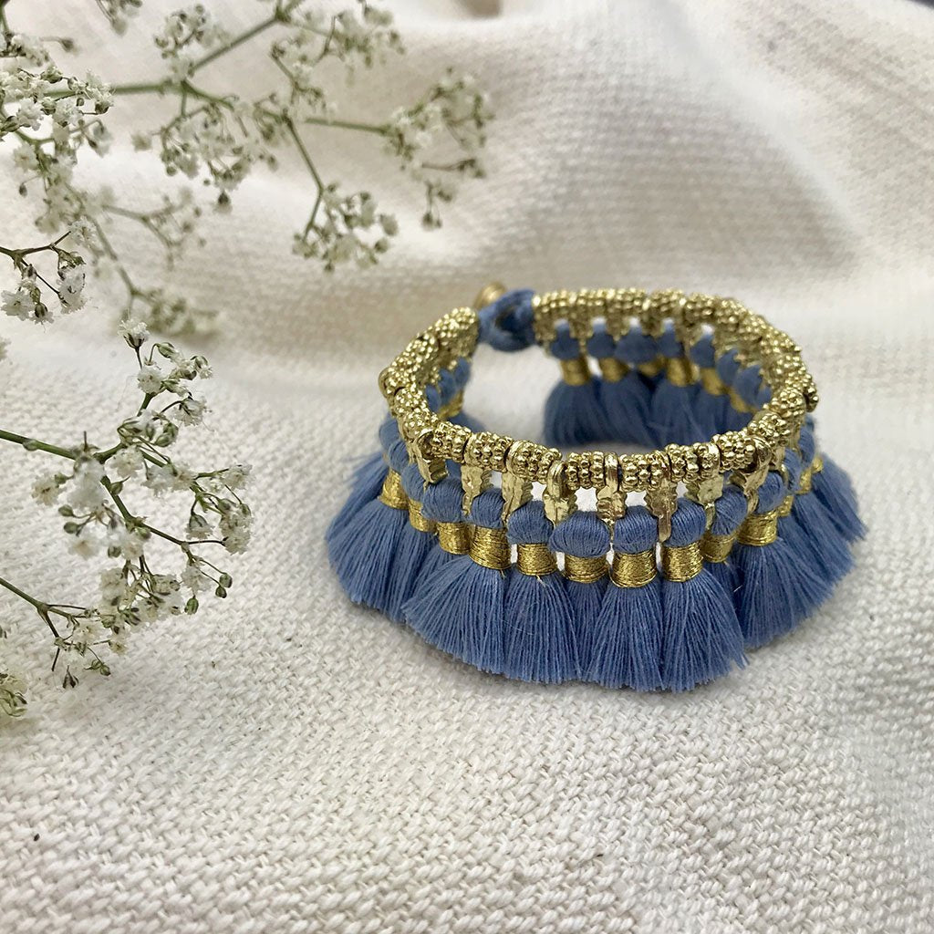 Ariel Kyra Tassel Bracelet featuring slate-colored beads and fringe tassels, stylish bohemian jewelry accessory