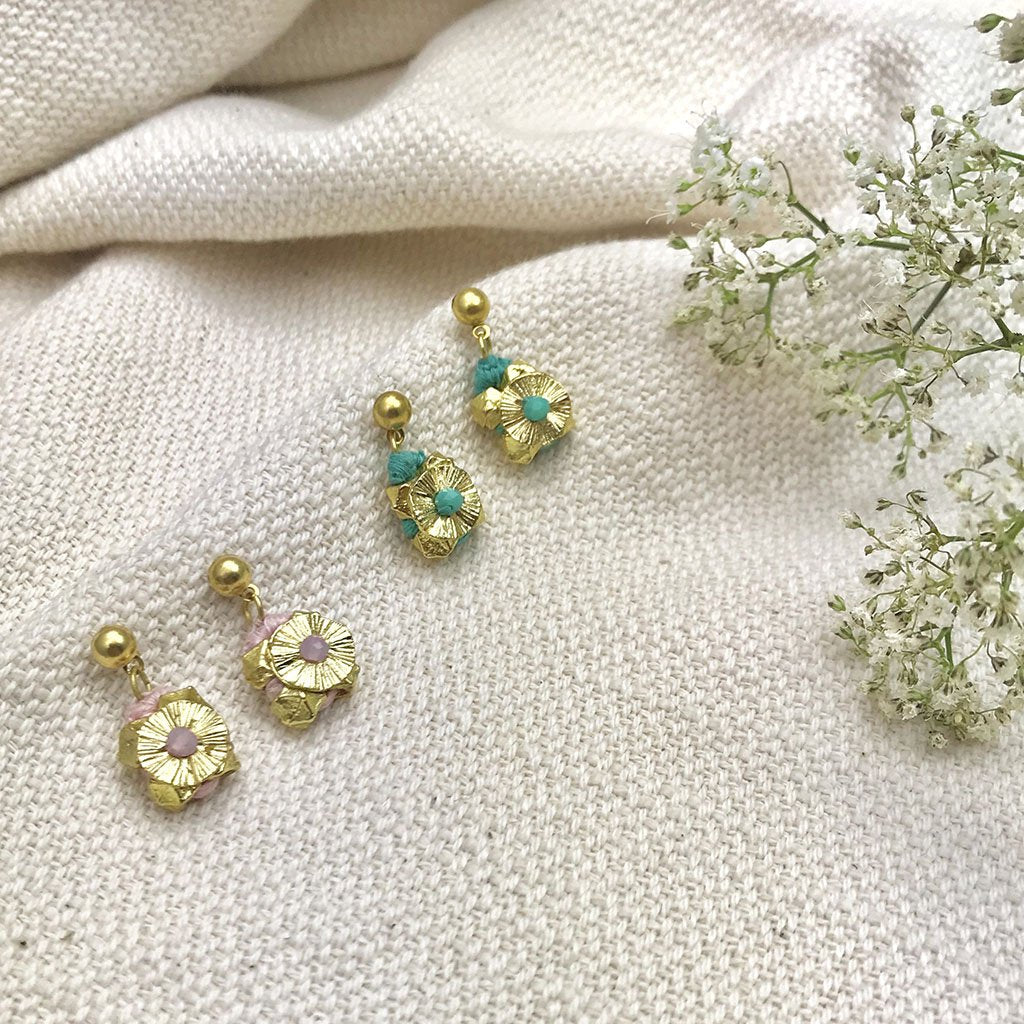Ariel Keya Flower Earrings featuring gold floral design with slate accents, elegant jewelry for special occasions.