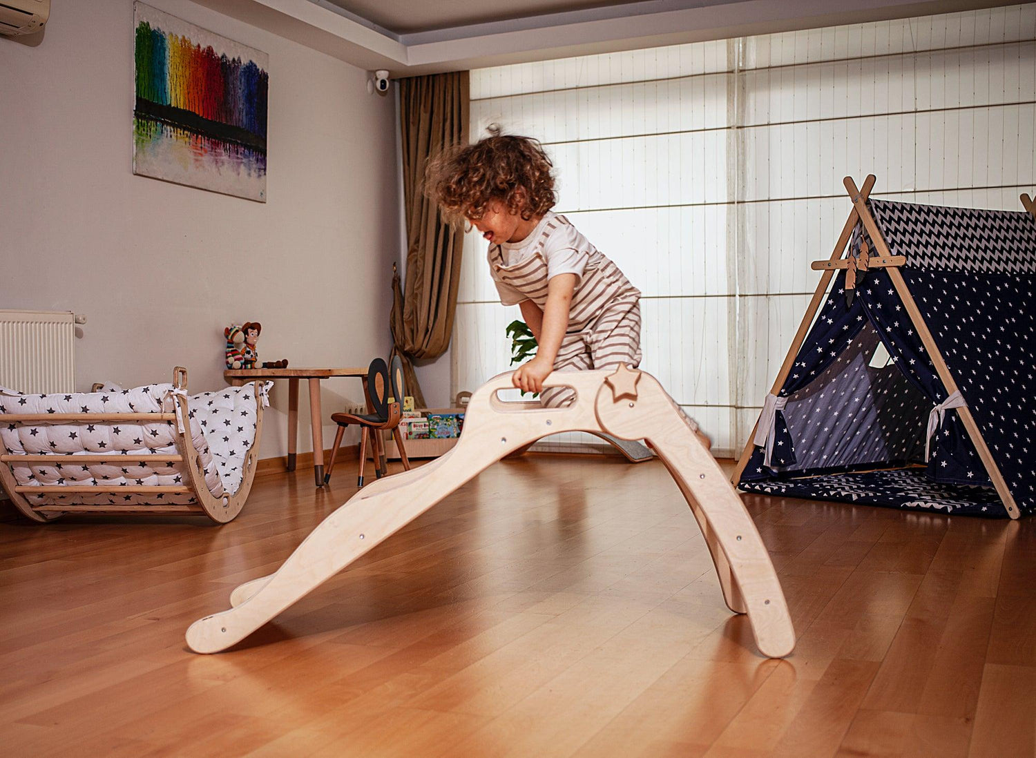 Foldable wooden slide from Red Oceanus, showcasing smooth wooden surface and sturdy foldable design for children&