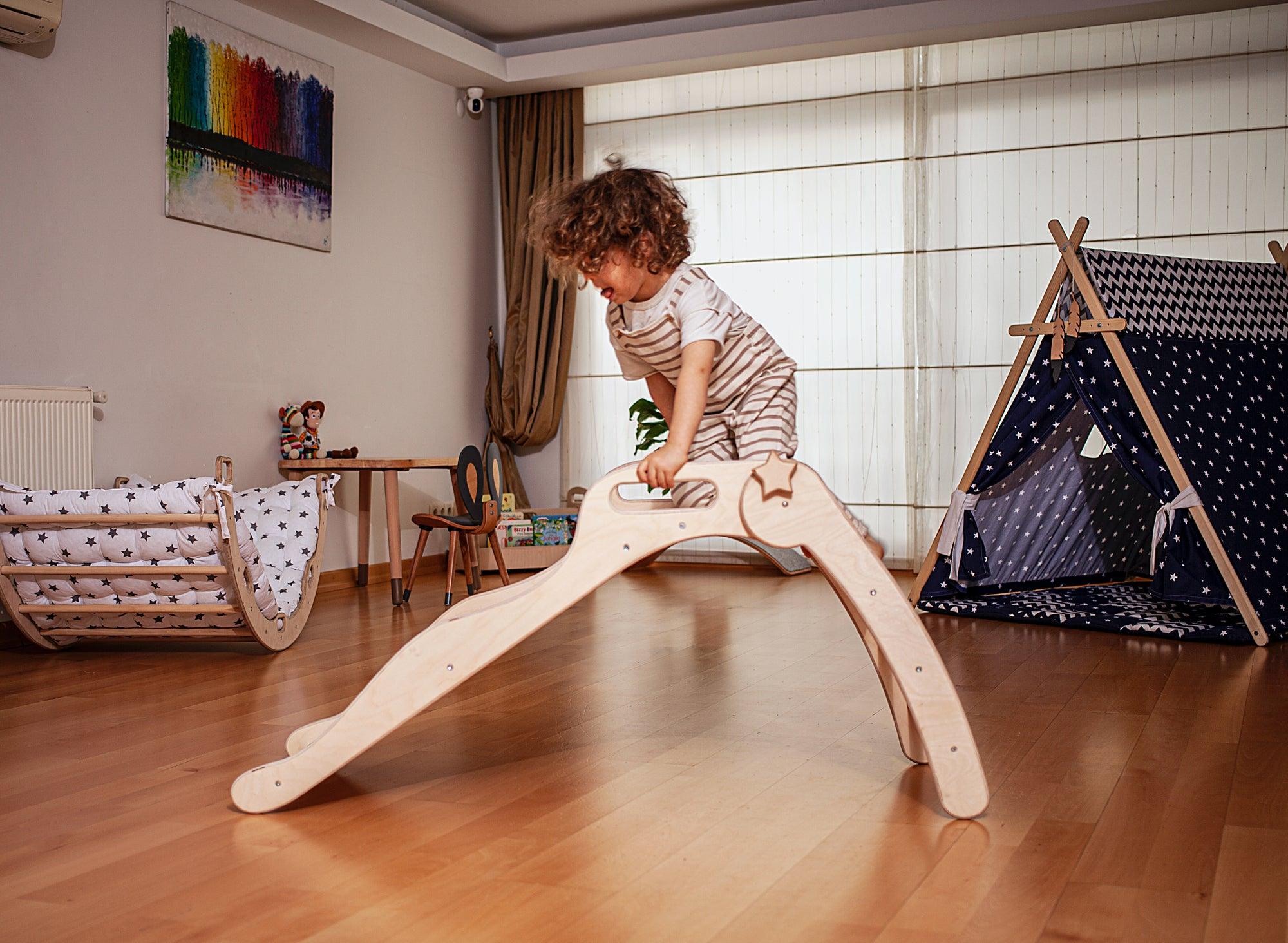 Foldable wooden slide from Red Oceanus, showcasing smooth wooden surface and sturdy foldable design for children&