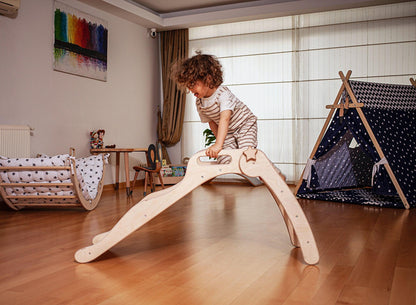 Foldable wooden slide from Red Oceanus, showcasing smooth wooden surface and sturdy foldable design for children&