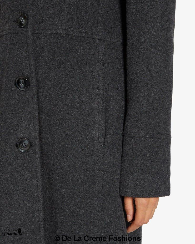 Rose Eleusis slim fit wool blend longline maxi coat in neutral tones, shown on a model with a tailored silhouette.