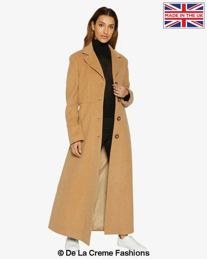 Camel slim fit wool blend longline maxi coat by Rose Eleusis, shown on a model, featuring a tailored design and classic silhouette.