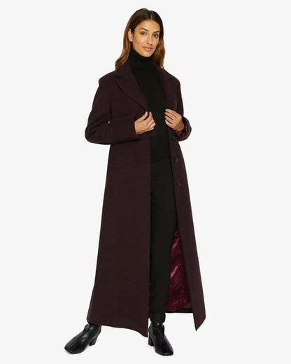 Rose Eleusis slim fit wool blend longline maxi coat in wine color, shown on a model, showcasing its tailored fit and elegant length.