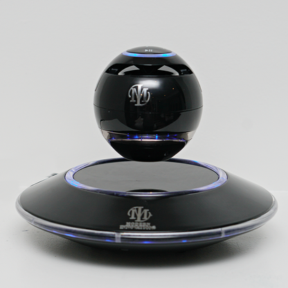 Black and white Levitating Bluetooth speaker by Pink Trillium, showcasing its floating design and sleek audio technology.