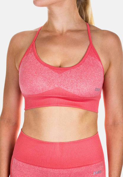 Pink Pear Juniper Sports Bra ICON for women, shown from the side with orange accents, designed for activewear and comfortable support.