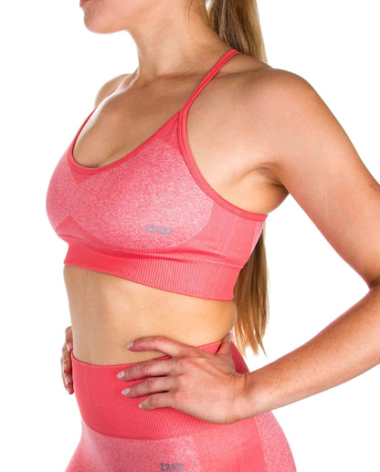 Pink Pear Juniper Sports Bra ICON for women, showing the front side with supportive design and vibrant color.