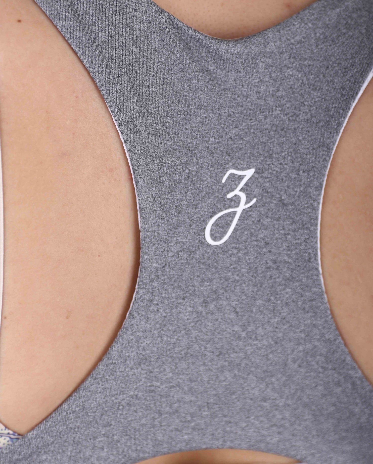 Grey Pear Juniper Sports Bra for women, shown from the back, featuring supportive design and breathable fabric.
