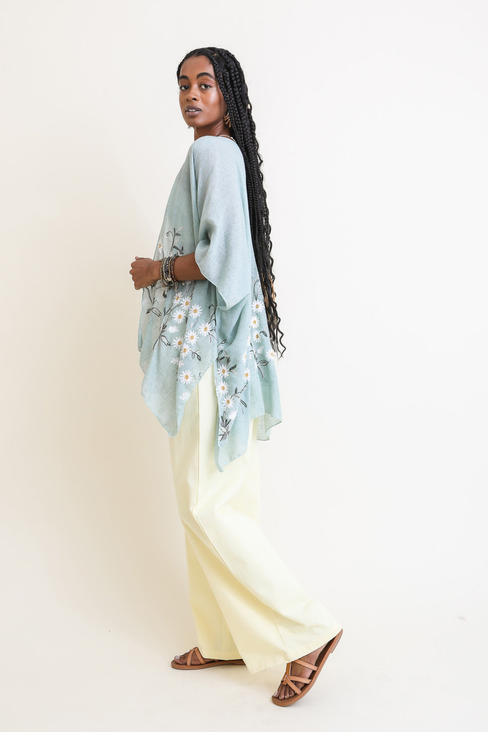 Light spring Daisy Kimono top by Periwinkle Aether, featuring floral patterns and flowing fabric, perfect for casual and elegant looks.