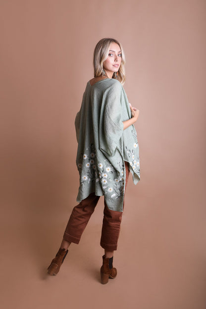 Periwinkle Aether Spring Daisy Kimono showcasing floral pattern, lightweight fabric, and relaxed fit, perfect for casual spring wear.