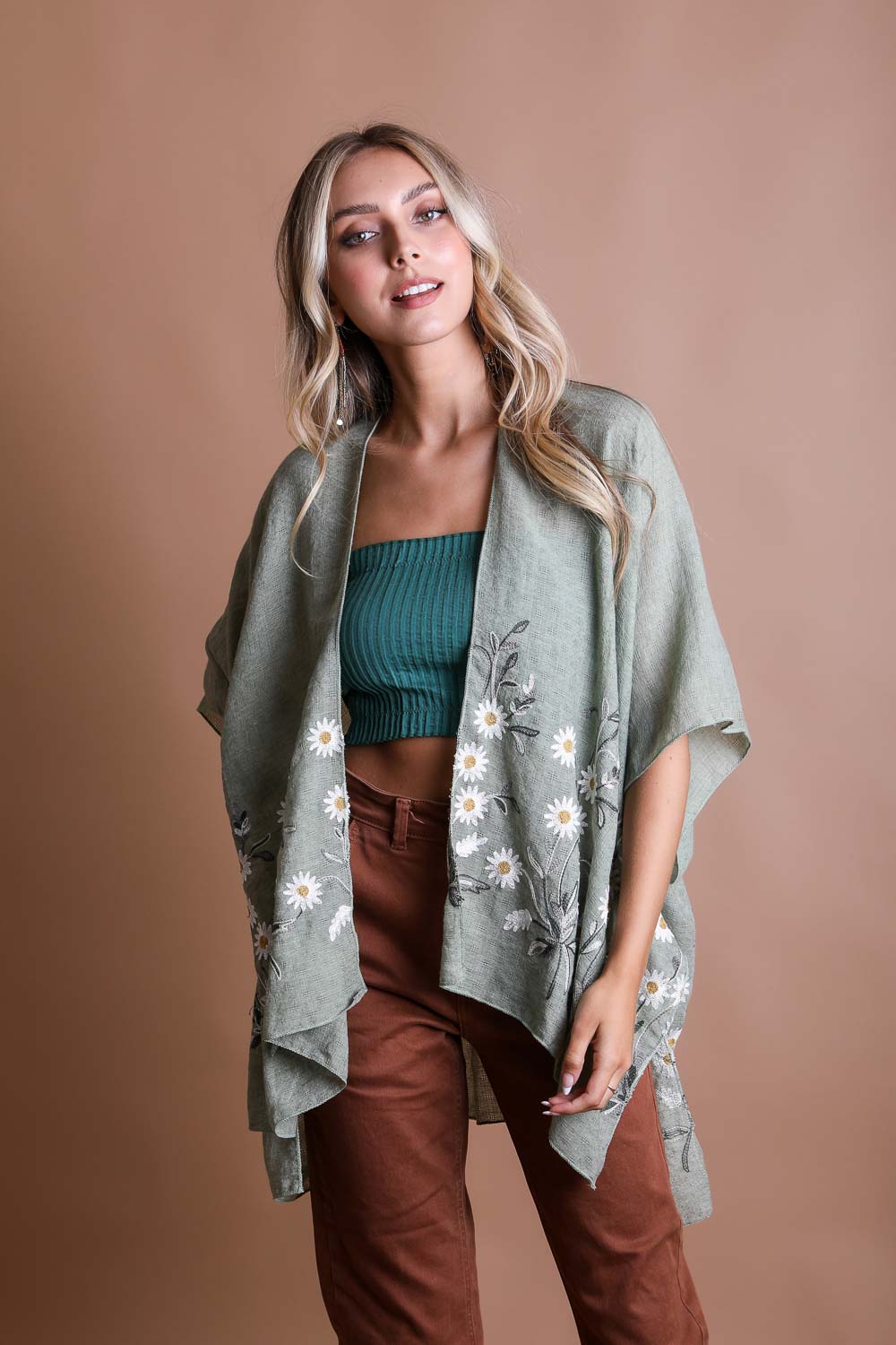 Sage green Spring Daisy Kimono by Periwinkle Aether, featuring floral patterns and lightweight fabric, perfect as a stylish blouse or layer.