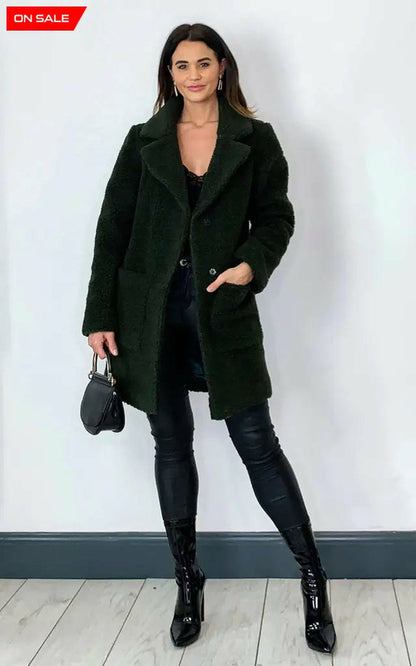 Rose Eleusis olive Borg teddy coat with stud button details, cozy oversized jacket for stylish winter warmth.