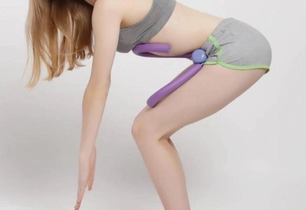 Yellow Pandora thigh and arm exercise muscle strengthening flexor equipment for lower and upper body muscle toning.