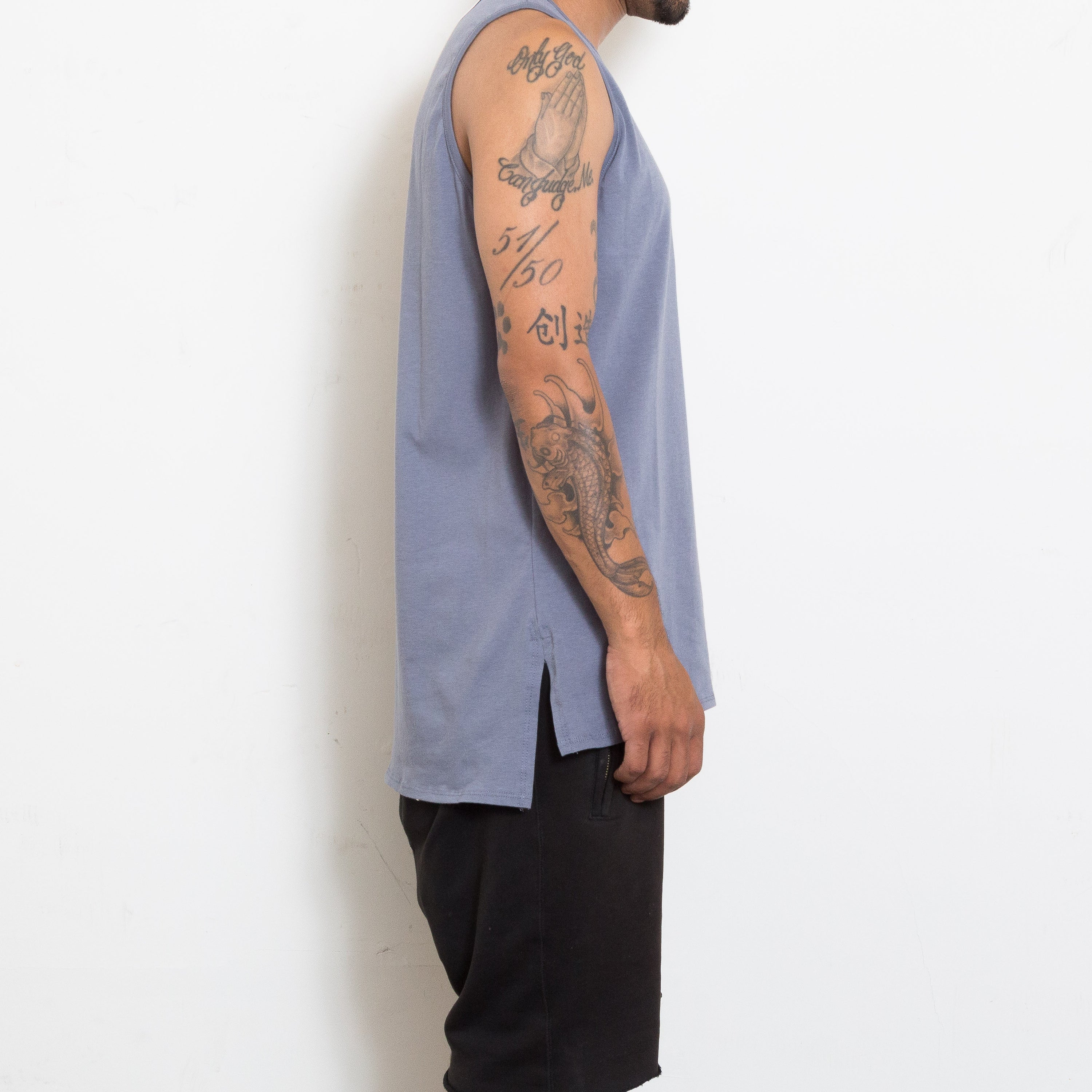 Lime Milo Basic Tank Top, sleeveless cotton tank top for women, shown in a neutral color.