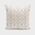 Golden Geo cushion by Scorpius featuring a modern geometric pattern on soft textile fabric.