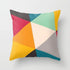Scorpius tilting triangles pillow with geometric triangle pattern in soft fabric, designed for comfort and decorative use.