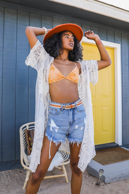 Colorful tie-dye triangle-style bralette by Periwinkle Aether, featuring soft fabric and comfortable lingerie design.