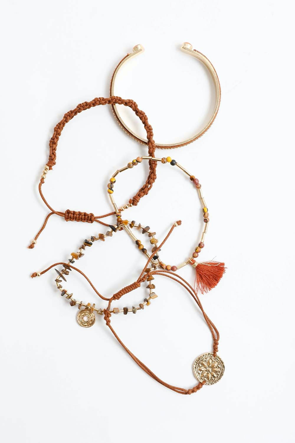 Stackable bracelet with tiger eye beads from Periwinkle Aether, featuring smooth, polished golden-brown gemstone beads.