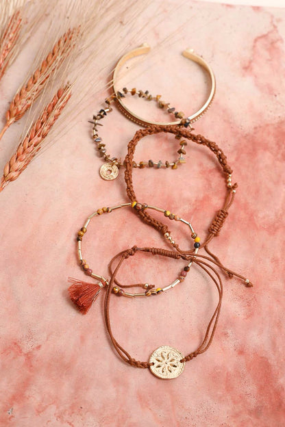 Stackable bracelet featuring polished tiger eye beads, crafted by Periwinkle Aether, perfect as a stylish accessories piece.