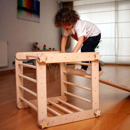 Red Oceanus transformable climbing cube with ramp, versatile furniture for kids to climb, explore, and play indoors.