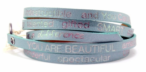 Turquoise wrap-around bracelet from Orange Eunostus with "You Are Beautiful" message, stylish accessory for any outfit.