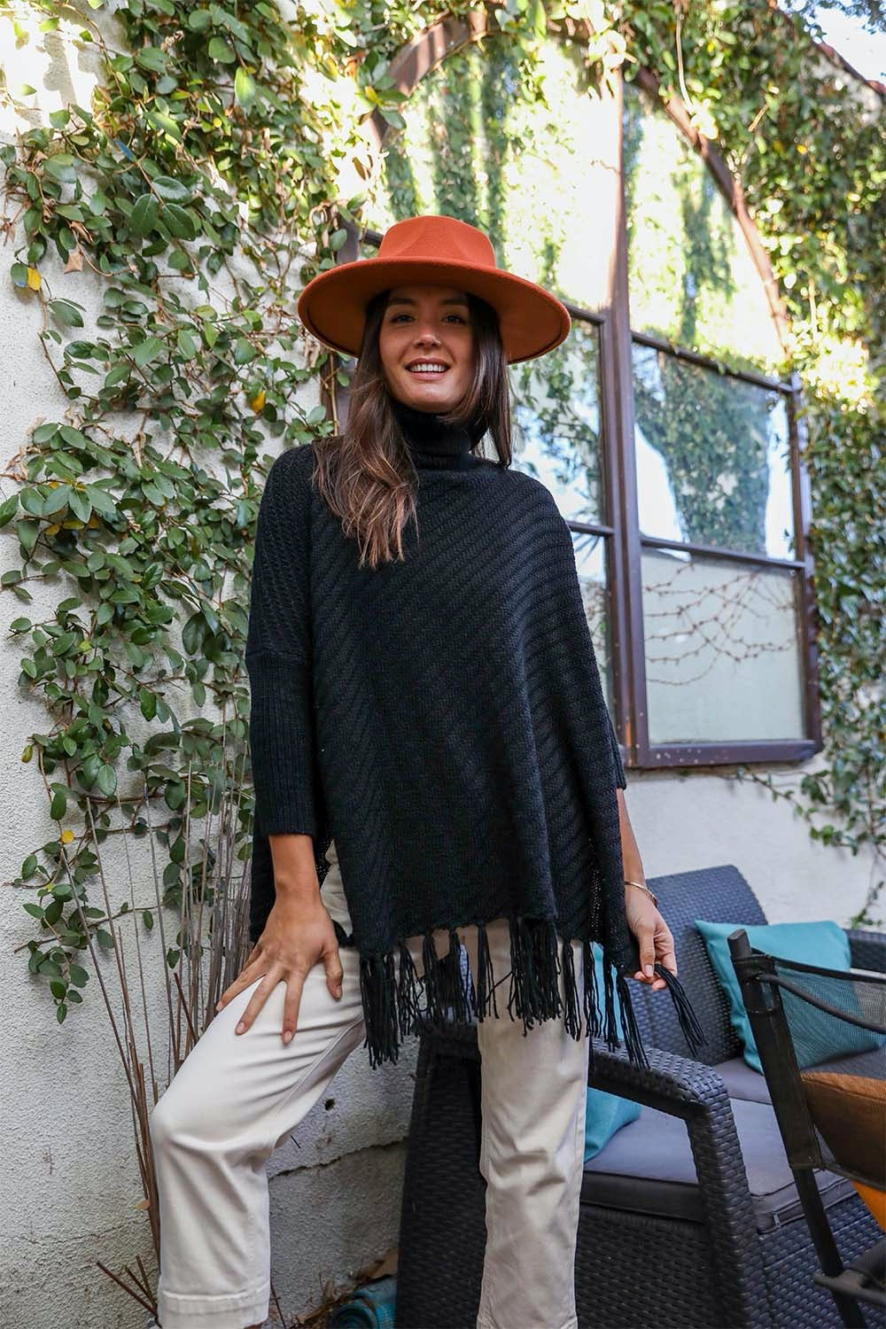 Periwinkle Aether sweater weather roll-neck poncho with turtleneck and frayed knit sleeves, cozy accessories for chilly days.