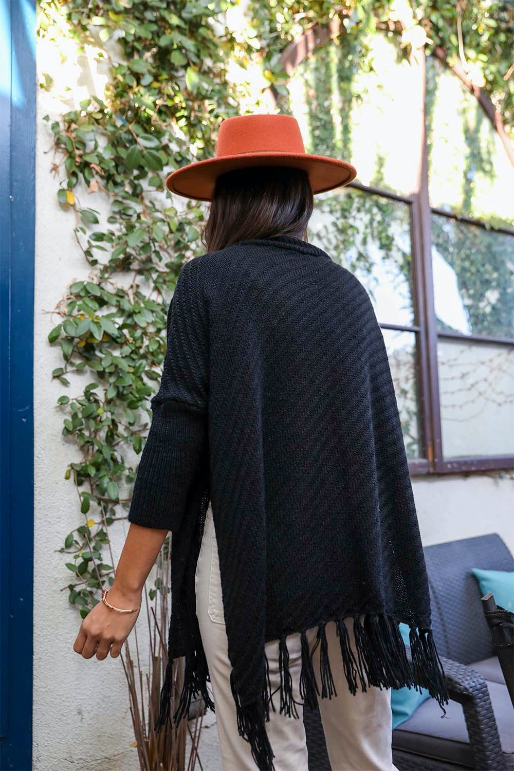 Periwinkle Aether sweater weather roll-neck poncho with turtleneck and frayed knit sleeves, cozy and stylish accessories.
