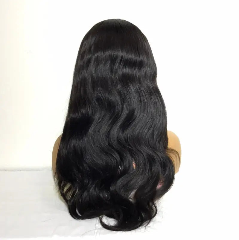 Peach Clymene U-nece U-part wig made of premium human hair, showcasing natural hair texture and versatile styling options.