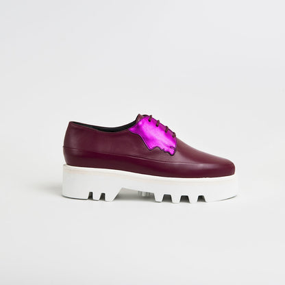 Fuchsia leather platform creepers by Red Electra, stylish footwear with chunky soles and bold color.