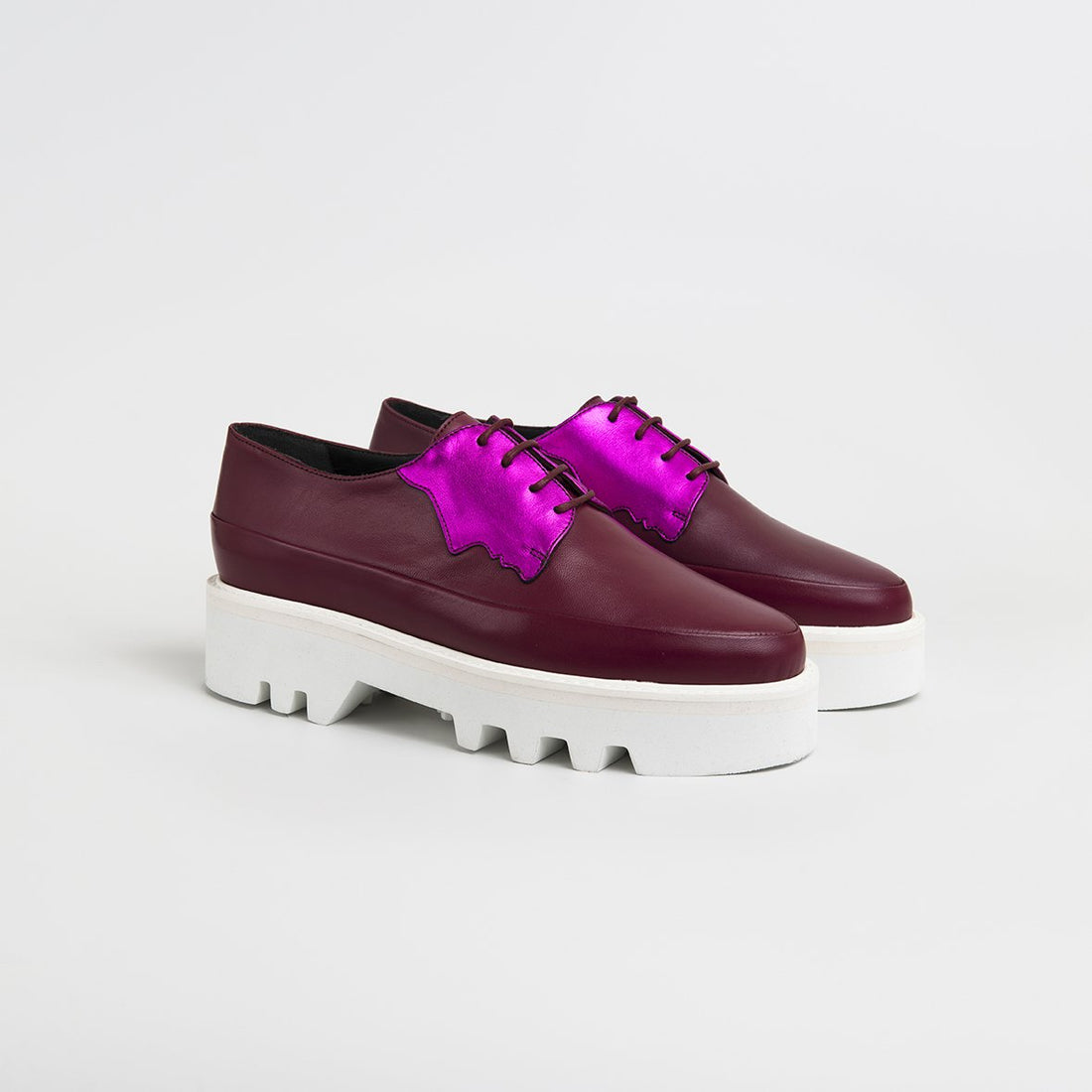 Red Electra Faced fuchsia leather platform creepers, stylish footwear with chunky soles and vibrant color, perfect for bold fashion statements.